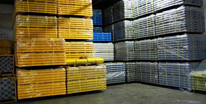 Warehouse stacks of parking blocks
